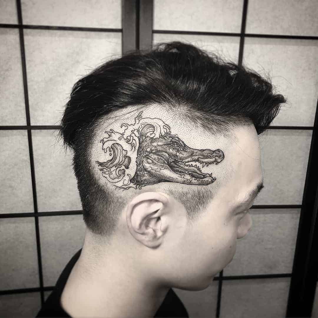 aligátor fej tetoválás